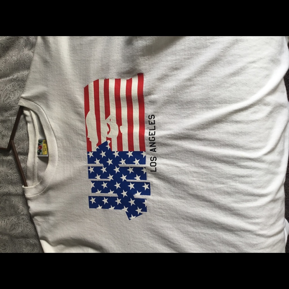 gently worn undefeated x bape t shirt